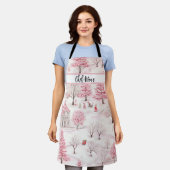 ピンクの冬の風景スノーウィーワンダーランドクリスマスナナ エプロン (着用した状態)