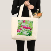 ピンクの出血ハート花 ラージトートバッグ (正面(商品))