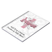 ピンクの十字または渦巻のナース ノートブック (左側)