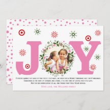 ピンクの喜びとクリスマスの花輪の写真