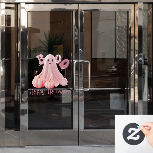 ピンクの幽霊ブーハッピーハローウィンウィンドウにしがみつく ウィンドウサイン (オフィスドア)