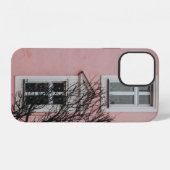 ピンクの建物の前の葉のない木 iPhoneケース (裏面横)
