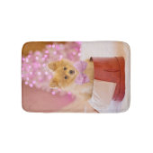 ピンクの弓のクリスマス写真を飾ったかわいい犬 バスマット (正面)