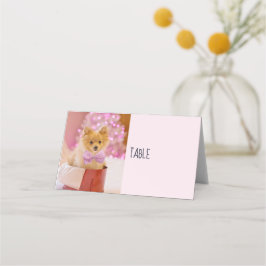 ピンクの弓のクリスマス写真を飾ったかわいい犬 プレイスカード