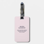 ピンクの弓のクリスマス写真を飾ったかわいい犬 ラゲッジタグ (裏面縦)