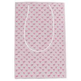 ピンクの弓パターンのバレンタインデー ミディアムペーパーバッグ