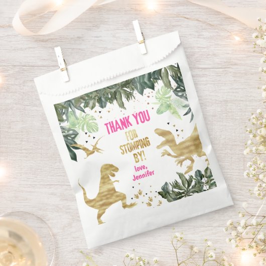 ピンクの恐竜の誕生日パーティー フェイバーバッグ (クリップ留めされた状態)