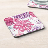 ピンクの星状体およびダリアが付いているパターン コースター (左側)