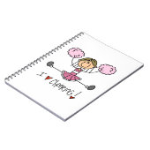 ピンクの棒の姿のチアリーダーのTシャツおよびギフト ノートブック (左側)