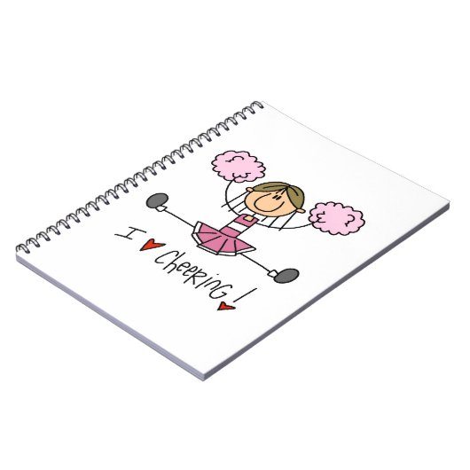 ピンクの棒の姿のチアリーダーのTシャツおよびギフト ノートブック (左側)