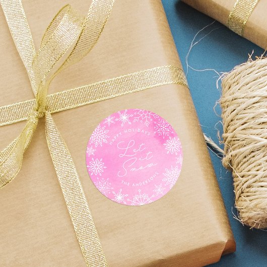 ピンクの水の色の雪の結晶を手放す雪の休日 ラウンドシール