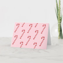 ピンクの水彩画に赤と白のキャンディケーンのストライプ