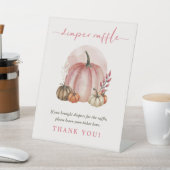 ピンクの甘いカボチャ赤ちゃん女の子シャワーおむつラッフル 台座サイン (インサイチュ)