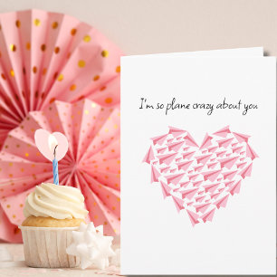 ピンクの紙飛行機のハート型飛行機あなたに夢中 カード