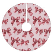 ピンクの背景にクリスマスレッドボウ ブラッシュドポリエステルツリースカート (正面)