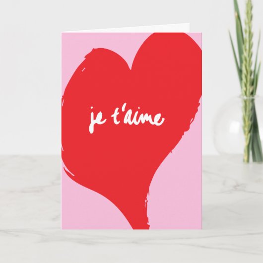 ピンクの背景に「je t’aime」と書かれた赤いハート カード (正面)