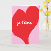 ピンクの背景に「je t’aime」の文字の赤いハート カード (黄色い花)