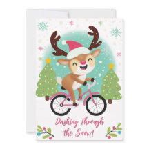 ピンクの自転車クリスマスカードに乗ったかわいいトナカイ