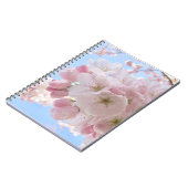 ピンクの花々青い空。 ノートブック (左側)