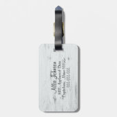 ピンクの花が付いているBullのスカル ラゲッジタグ (裏面縦)