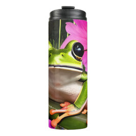 ピンクの花に囲まれた緑のカエル タンブラー