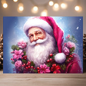 ピンクの花のサンタクロースのクリスマス シーズンカード