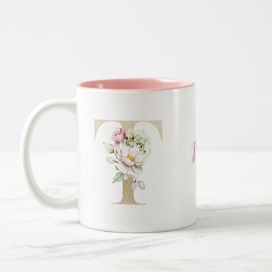 ピンクの花のモノグラム ゴールド T字 ツートーンマグカップ (左)