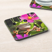 ピンクの花の枝に座るかわいいカエル   コースター (左側)