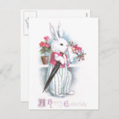 ピンクの花の花束を持つイースターバニー シーズンポストカード (正面/裏面)