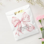 ピンクの蝶結びベイビーシャワーのコケッテイ ボウ テーマ フェイバーバッグ (封をした状態)