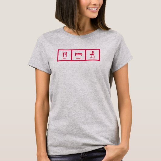 ピンクの面白い買い物中毒は買い物して寝る 賞 Tシャツ (正面)
