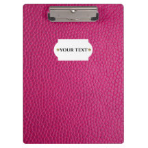 ピンクの革のクリップボード
