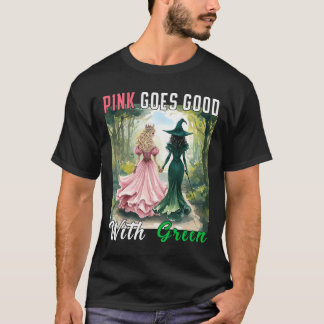 ピンクの魔女は緑のハロウィーンの魔女を見ると上手に行く Tシャツ