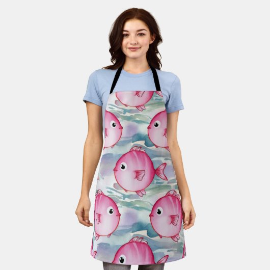 ピンクの魚柄 エプロン (着用した状態)