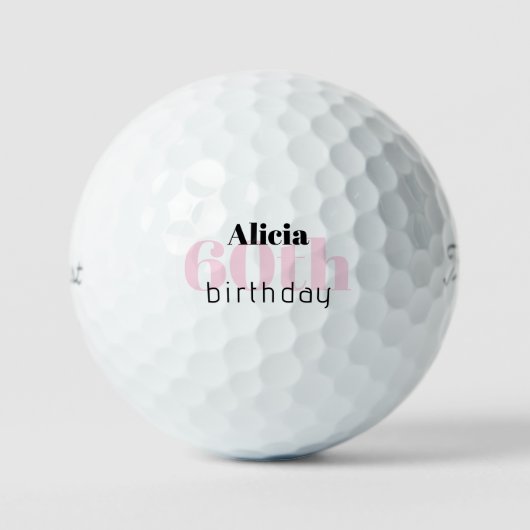ピンクの60歳の誕生日 カスタムネーム Titleist Pro V1 ゴルフボール (正面)