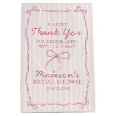 ピンクの コケッタ ボウ パステル ブライダル シャワー お礼の品 ミディアムペーパーバッグ (正面)