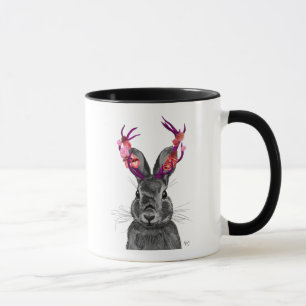 ピンクの(雄ジカの)枝角を搭載するJackalope マグカップ