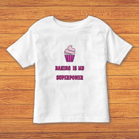 ピンクカップケーキベーキング超電力 トドラーTシャツ