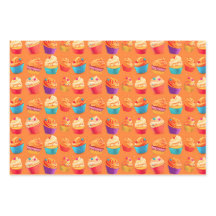 ピンクカラフル、オレンジ、黄色の誕生日カップケーキ