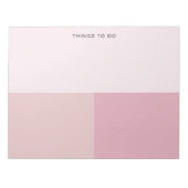 ピンクカラーブロックの引き裂きを作成するリストを作成するには遠くに ノートパッド (正面)