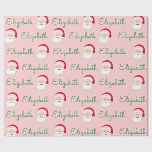 ピンクサンタ顔パーソナライズのクリスマスホリデーギフト ラッピングペーパー (フラット)