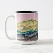 ピンクスカイ白熱［赤熱］光を放つマウンテンの風景 ツートーンマグカップ (左)