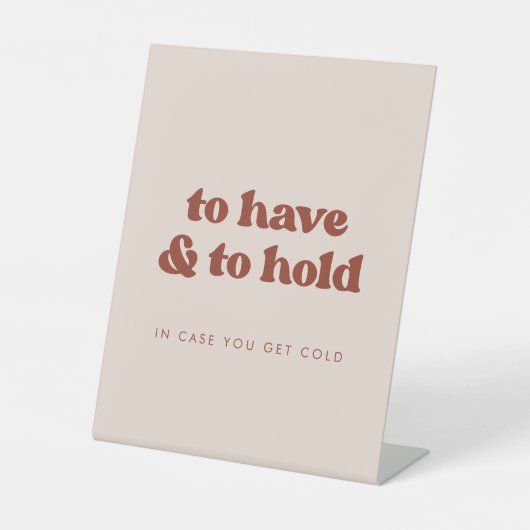 ピンクスタイリッシュ色で毛布を持って結婚いる 台座サイン (正面)