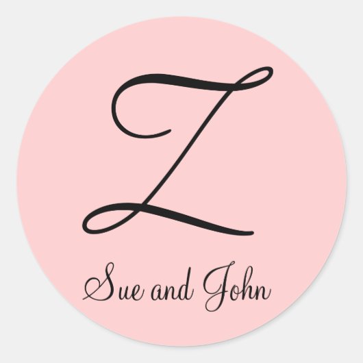 ピンクステッカーの名とイニシャルブラック ラウンドシール (正面)