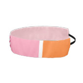 ピンクストライプ、白、オレンジ色のモノグラムの アスレチックヘッドバンド (右)