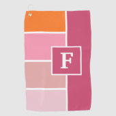 ピンクストライプ、白、オレンジ色のモノグラムの ゴルフタオル (正面)