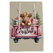 ピンクハイランドカウのクリスマスガーリーフラッフィーなトラックの中の牛 ミディアムペーパーバッグ (裏面)