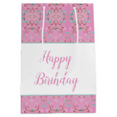 ピンクパターン（の模様が）ある抱き枕アクセント付きティール（緑がかった色） ミディアムペーパーバッグ (裏面)