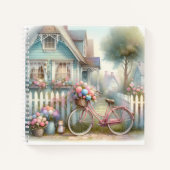 ピンクフラワーバイクアットブルーコテージゲート ノートブック (正面)