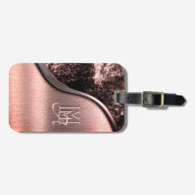 ピンクブラシ仕上げメタルおよびメタリックモノグラムのストーン